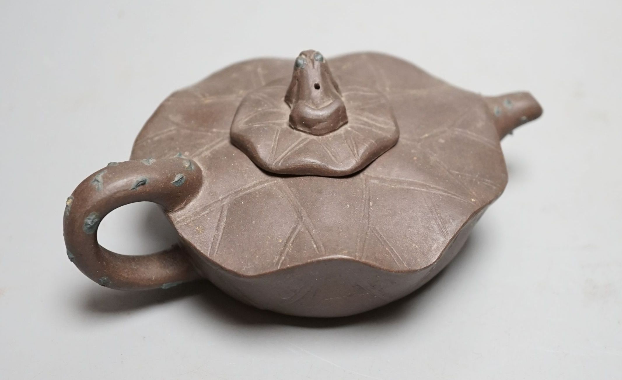 A Yixing clay teapot.